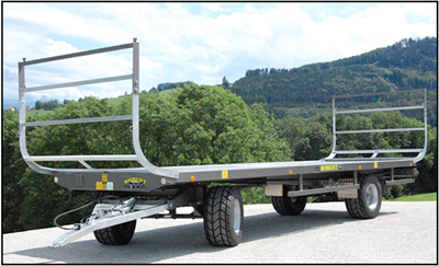 Char et remorque à balles rondes